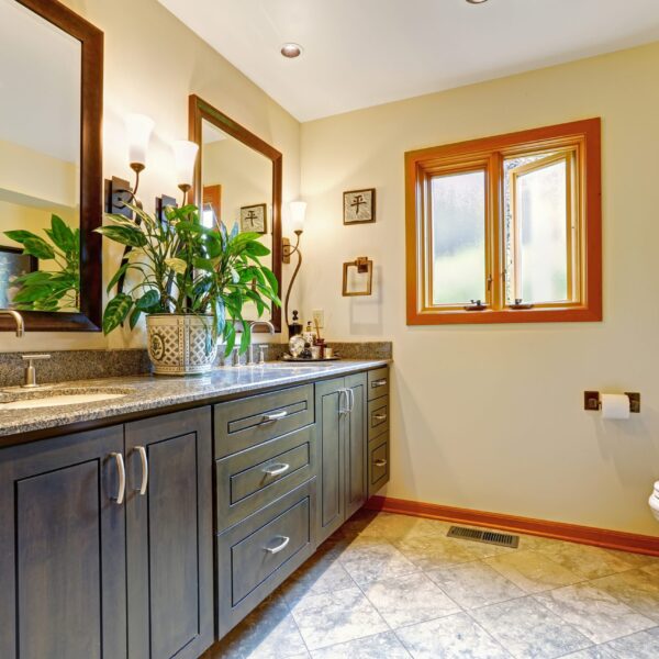 Modern Bathroom Interior With Big Cabinet And Two Mirrors