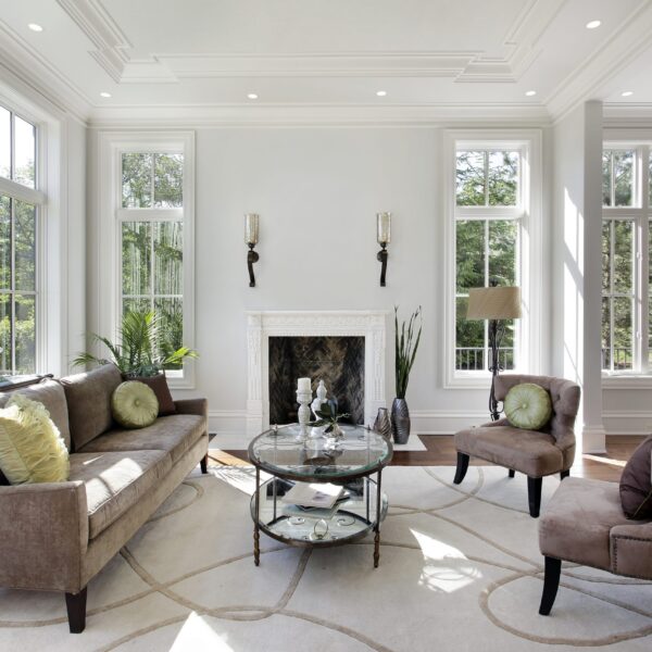 Living Room In Luxury Home With Fireplace.