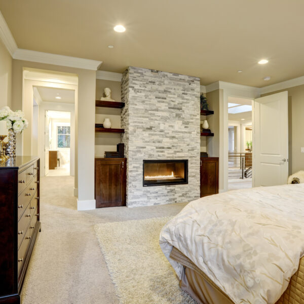 Master Bedroom With Stone Fireplace